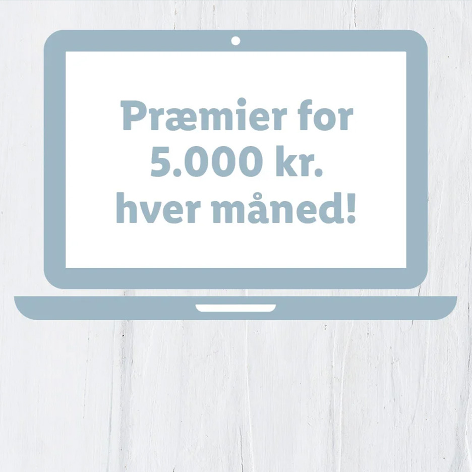 En bærbar computer med teksten 'Præmier for 5.000 kr. hver måned!' på skærmen.